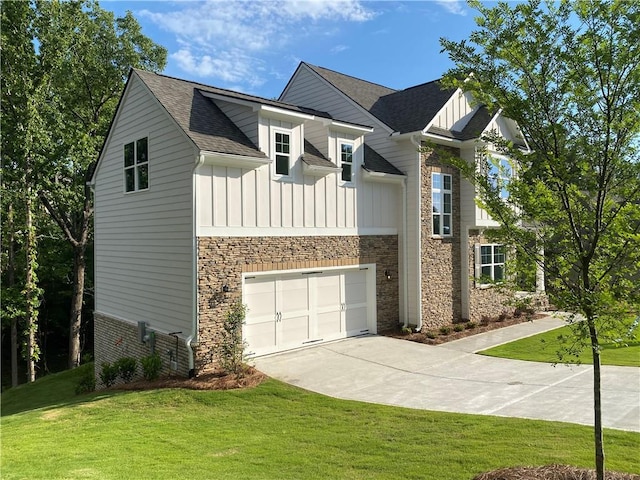 view of front facade featuring board and batten siding, concrete driveway, a front lawn, and stone siding