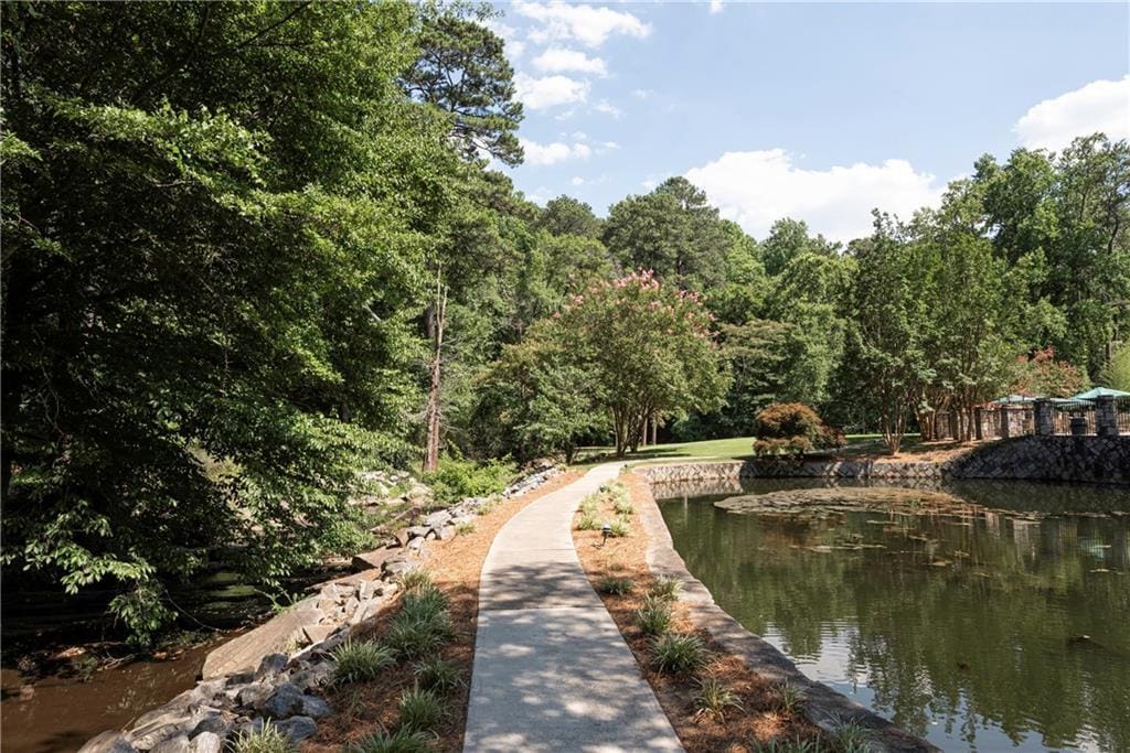 view of home's community featuring a water view