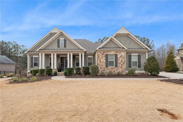 craftsman-style house featuring covered porch