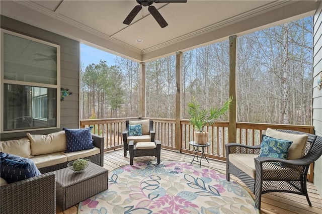 sunroom with ceiling fan