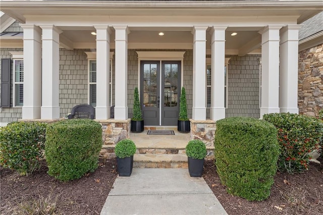 doorway to property featuring covered porch