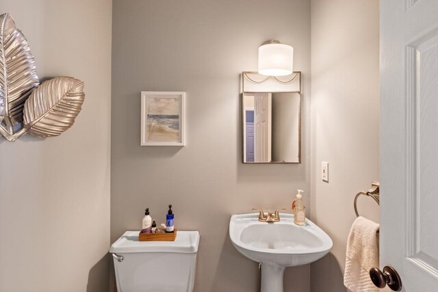 120 Ashewoode Downs Ln, Alpharetta, GA 30005 - half bathroom featuring toilet and a sink