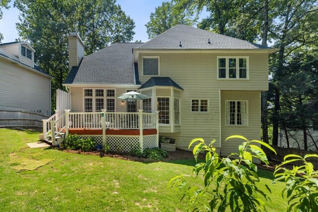 120 Ashewoode Downs Ln, Alpharetta, GA 30005 - back of property featuring a deck, a chimney, and a shingled roof