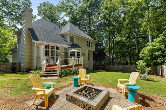 120 Ashewoode Downs Ln, Alpharetta, GA 30005 - back of property with a fire pit, a patio area, a deck, a fenced backyard, and a chimney