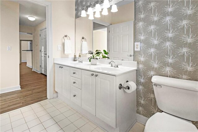 kitchen with appliances with stainless steel finishes, rail lighting, tasteful backsplash, a textured ceiling, and sink