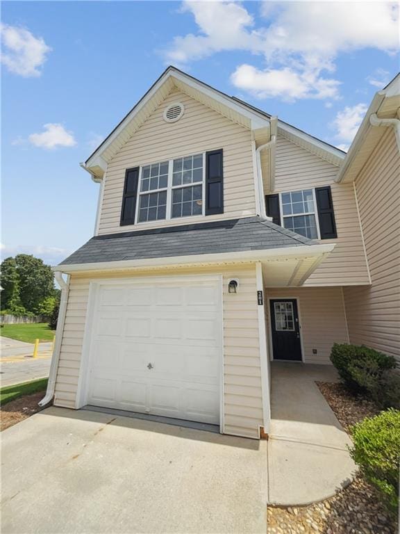 view of front of property featuring a garage