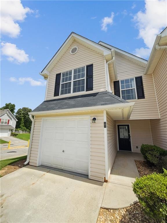 view of front of property featuring a garage