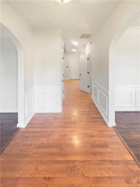 hallway featuring hardwood / wood-style floors