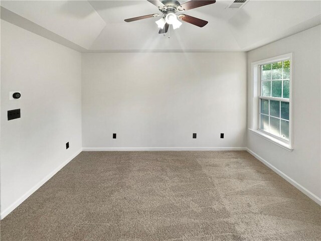 spare room with lofted ceiling, ceiling fan, and carpet floors