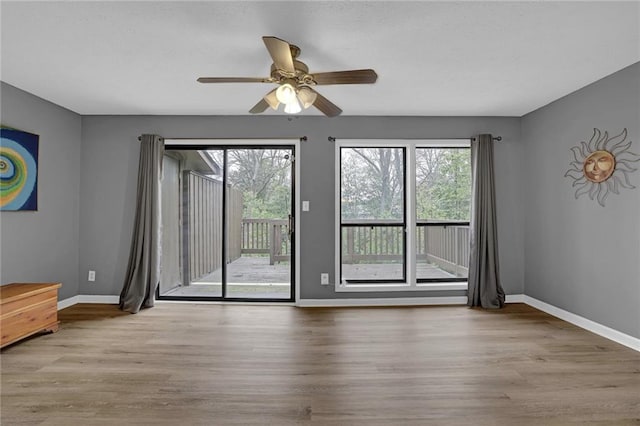 3906 Cedar Cir Unit 3906, Tucker, GA 30084 - unfurnished room featuring wood finished floors and a ceiling fan
