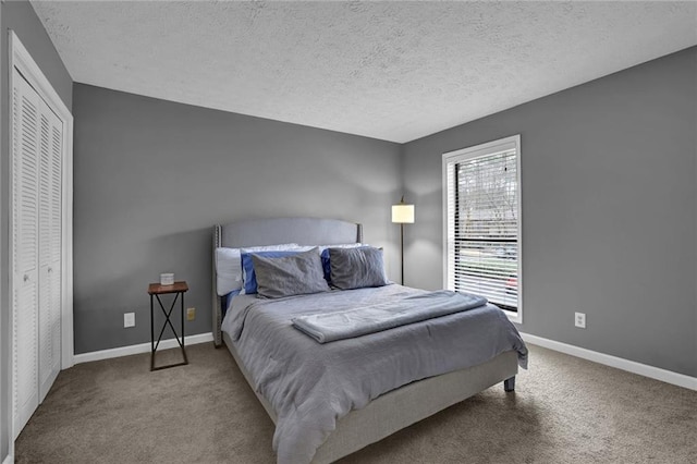 3906 Cedar Cir Unit 3906, Tucker, GA 30084 - carpeted bedroom featuring a textured ceiling and a closet