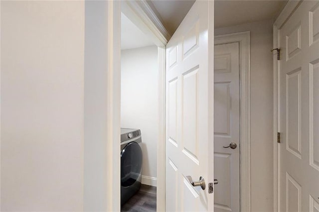 3275 Lenox Rd NE Unit 413, Atlanta, GA 30324 - laundry area featuring washer / dryer and dark wood-style flooring