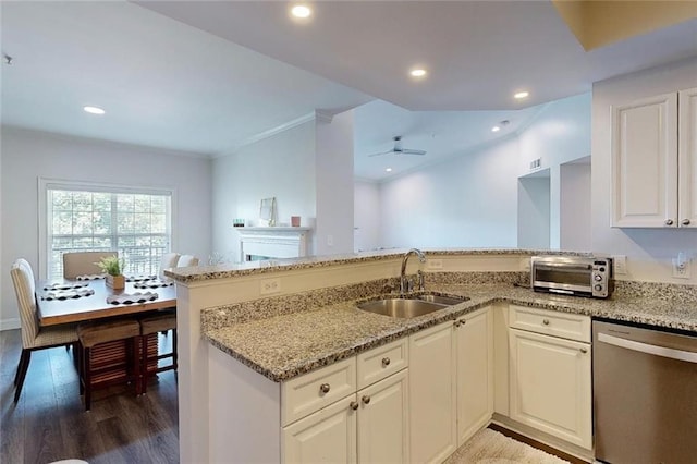 3275 Lenox Rd NE Unit 413, Atlanta, GA 30324 - kitchen featuring stainless steel dishwasher, light stone countertops, wood finished floors, a peninsula, and a ceiling fan