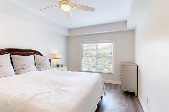 3275 Lenox Rd NE Unit 413, Atlanta, GA 30324 - bedroom featuring dark wood-type flooring, a ceiling fan, and recessed lighting