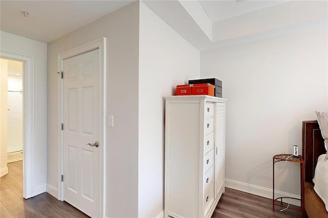 3275 Lenox Rd NE Unit 413, Atlanta, GA 30324 - unfurnished bedroom featuring dark wood-style floors and baseboards