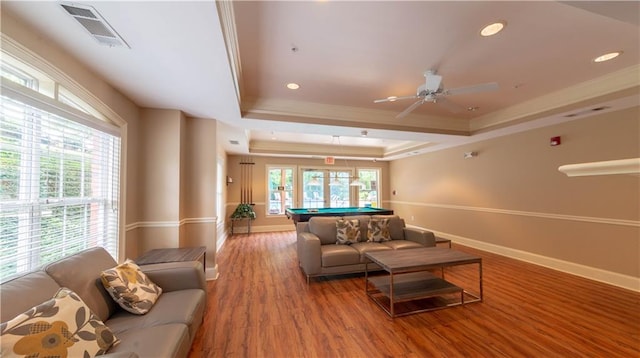 3275 Lenox Rd NE Unit 413, Atlanta, GA 30324 - living area with a tray ceiling, crown molding, pool table, wood finished floors, and a ceiling fan
