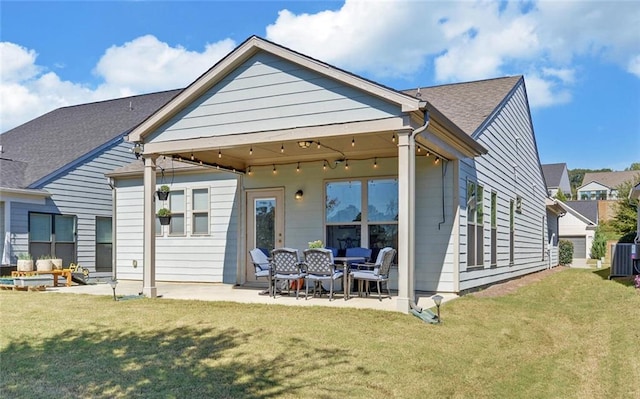 5638 Maple Bluff Way, Hoschton, GA 30548 - rear view of house featuring a patio, a lawn, and central AC unit