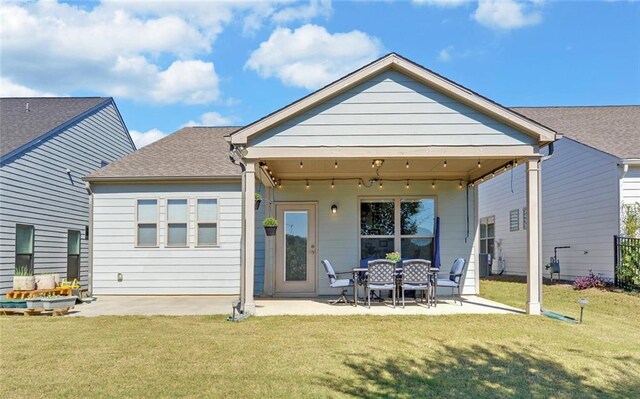 5638 Maple Bluff Way, Hoschton, GA 30548 - back of house featuring a yard and a patio