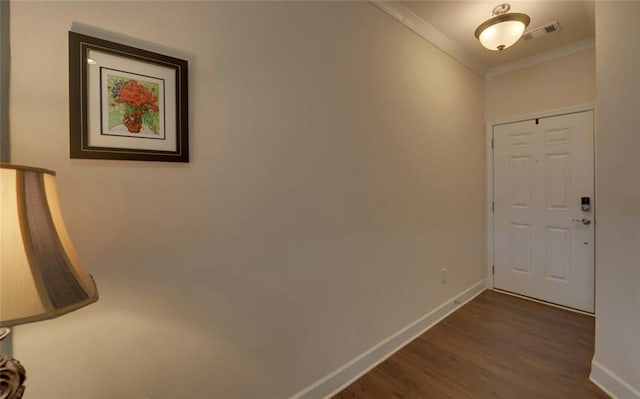 5638 Maple Bluff Way, Hoschton, GA 30548 - foyer featuring visible vents, crown molding, baseboards, and wood finished floors