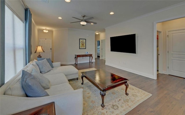 5638 Maple Bluff Way, Hoschton, GA 30548 - living room featuring ceiling fan, baseboards, wood finished floors, and ornamental molding