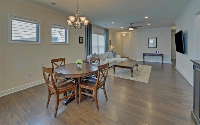 5638 Maple Bluff Way, Hoschton, GA 30548 - dining space featuring ceiling fan with notable chandelier, baseboards, dark wood-style flooring, and ornamental molding