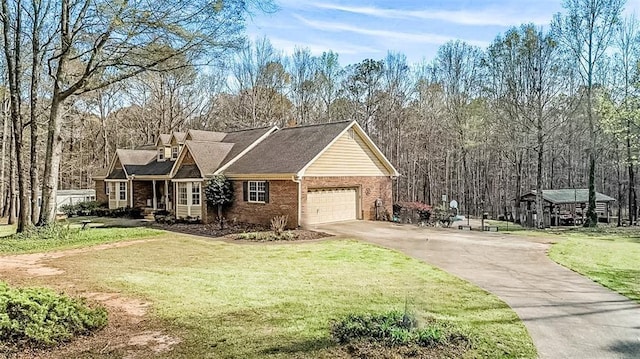 view of front facade with a garage and a front lawn