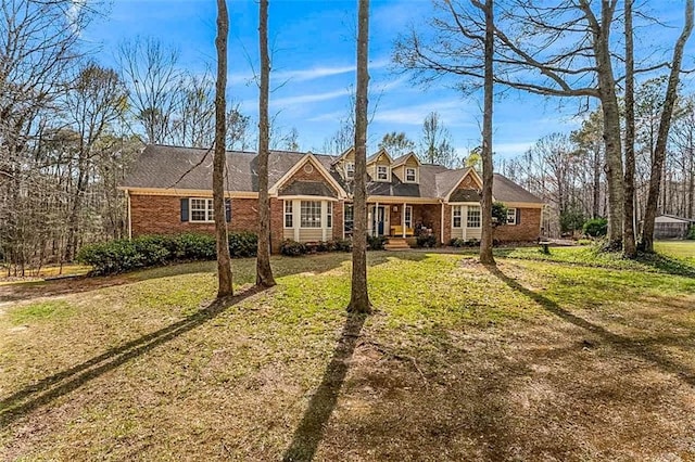 view of front of home with a front lawn