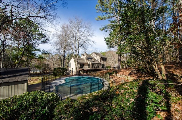 view of pool with a fenced in pool