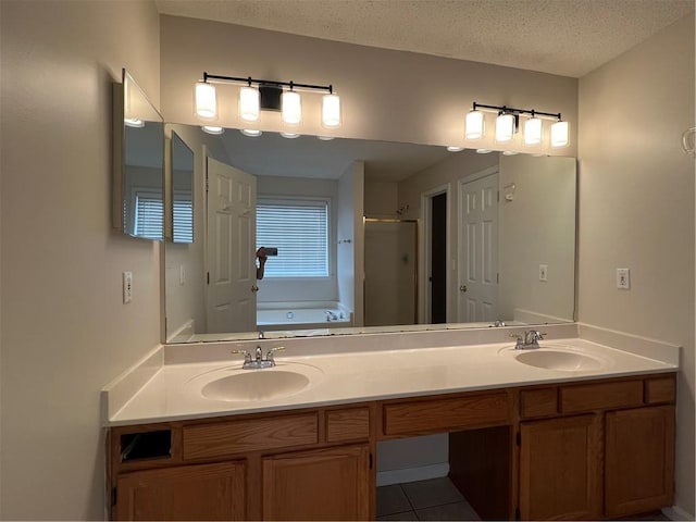 11800 Carriage Park Ln, Johns Creek, GA 30097 - bathroom with a shower stall, double vanity, a garden tub, tile patterned flooring, and a textured ceiling