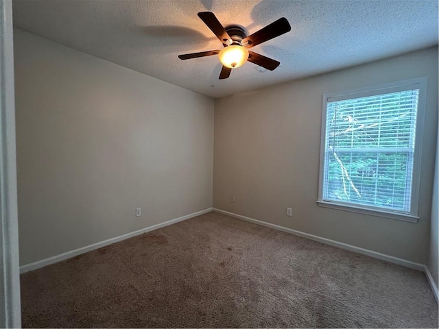 11800 Carriage Park Ln, Johns Creek, GA 30097 - spare room with ceiling fan, carpet, and a textured ceiling