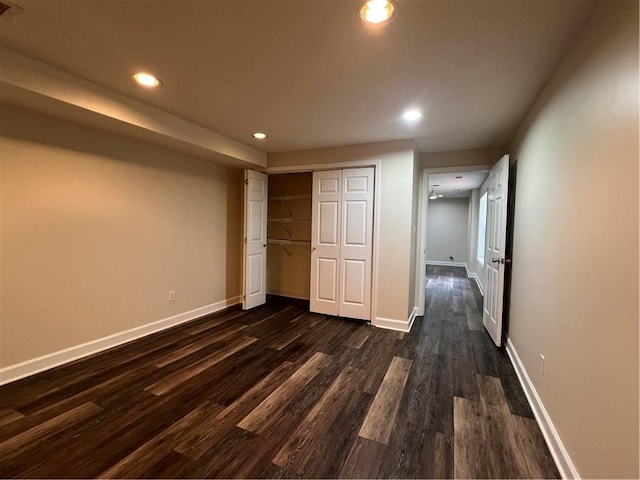 11800 Carriage Park Ln, Johns Creek, GA 30097 - unfurnished bedroom featuring dark wood-style floors, recessed lighting, and a closet