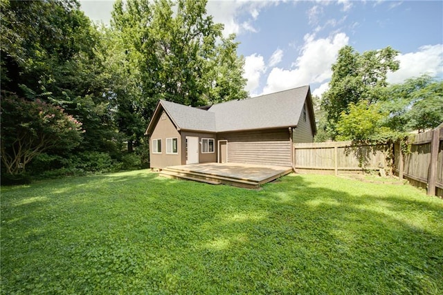 1066 Sea Oats Way SW, Lilburn, GA 30047 - rear view of property with a fenced backyard and a deck