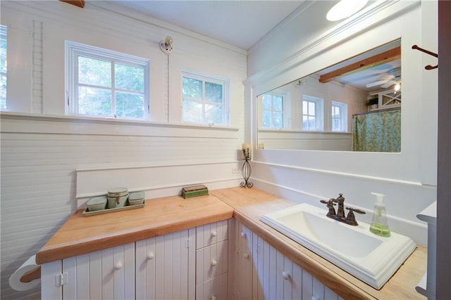 1066 Sea Oats Way SW, Lilburn, GA 30047 - bathroom with vanity, crown molding, and a shower with shower curtain