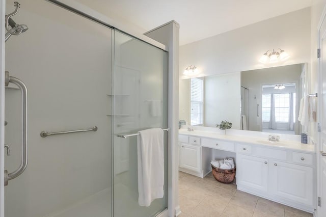 502 Helene Ct, Woodstock, GA 30188 - bathroom featuring a shower stall, double vanity, and tile patterned flooring