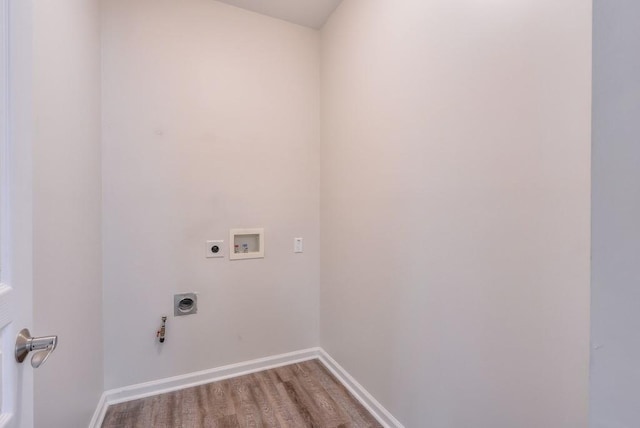 502 Helene Ct, Woodstock, GA 30188 - laundry room featuring hookup for an electric dryer, washer hookup, wood finished floors, baseboards, and gas dryer hookup