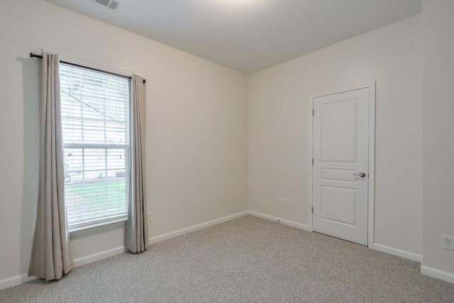 502 Helene Ct, Woodstock, GA 30188 - carpeted spare room featuring healthy amount of natural light and baseboards