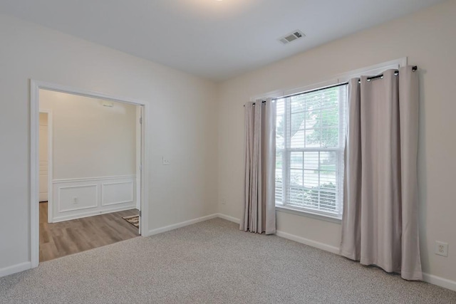 502 Helene Ct, Woodstock, GA 30188 - carpeted empty room with plenty of natural light and baseboards