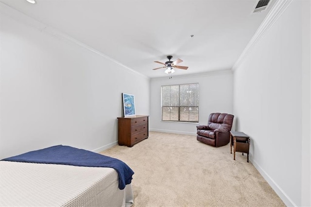 carpeted bedroom featuring crown molding and ceiling fan