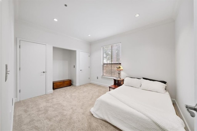 carpeted bedroom with crown molding