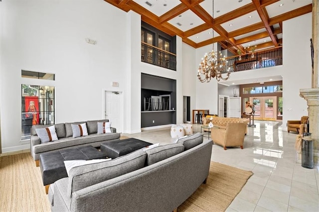 living room featuring a towering ceiling, coffered ceiling, beamed ceiling, light tile patterned flooring, and a chandelier