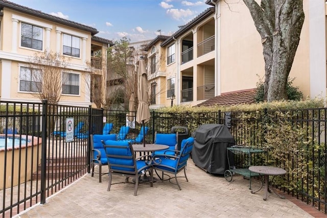 view of patio / terrace with a grill