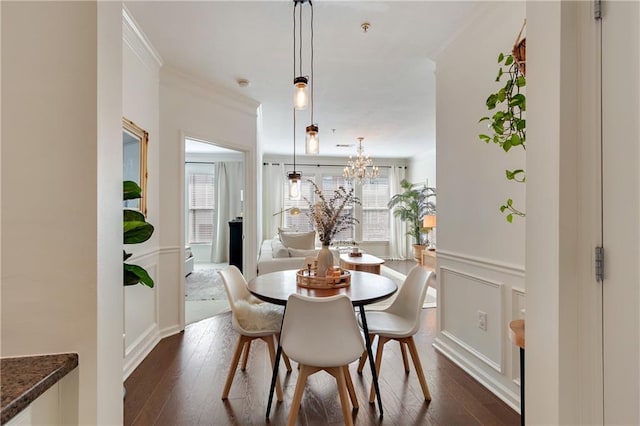 1850 Cotillion Dr Unit 2304, Dunwoody, GA 30338 - dining space with crown molding, healthy amount of natural light, dark wood-style floors, and a chandelier