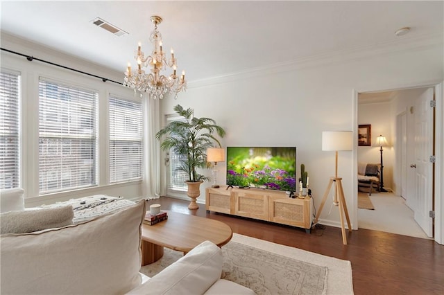 1850 Cotillion Dr Unit 2304, Dunwoody, GA 30338 - living room with a chandelier, wood finished floors, baseboards, and ornamental molding