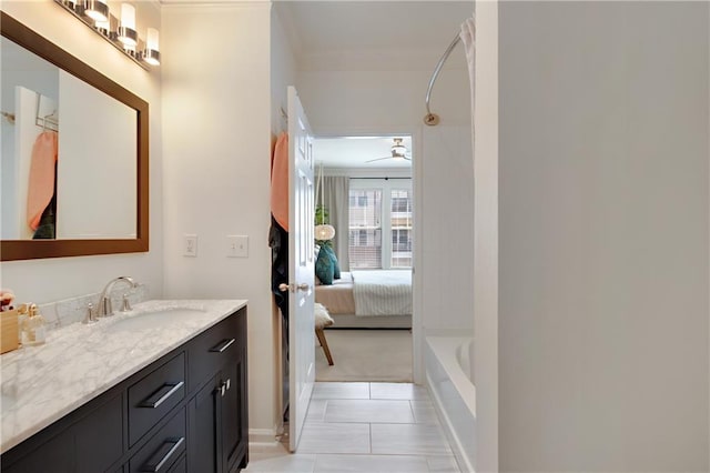1850 Cotillion Dr Unit 2304, Dunwoody, GA 30338 - full bathroom featuring ornamental molding, vanity, tile patterned flooring, connected bathroom, and a ceiling fan