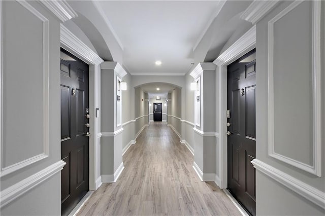 1850 Cotillion Dr Unit 2304, Dunwoody, GA 30338 - entrance foyer with arched walkways, light wood-style floors, baseboards, crown molding, and recessed lighting