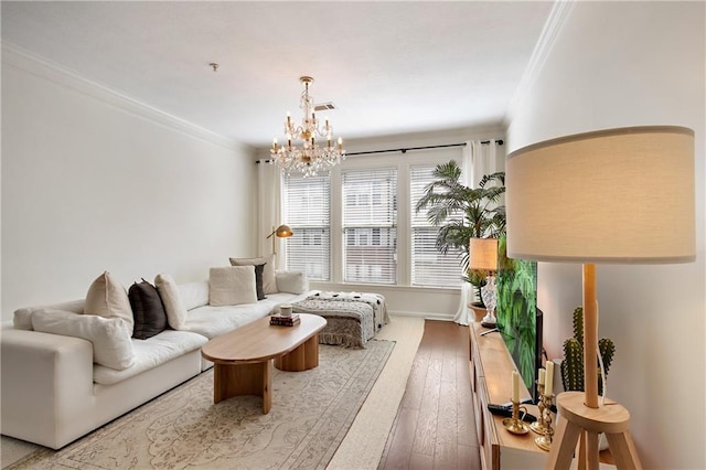 1850 Cotillion Dr Unit 2304, Dunwoody, GA 30338 - living area featuring ornamental molding, a chandelier, wood-type flooring, and baseboards