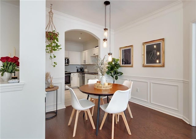 1850 Cotillion Dr Unit 2304, Dunwoody, GA 30338 - dining area with wood finished floors, arched walkways, and ornamental molding