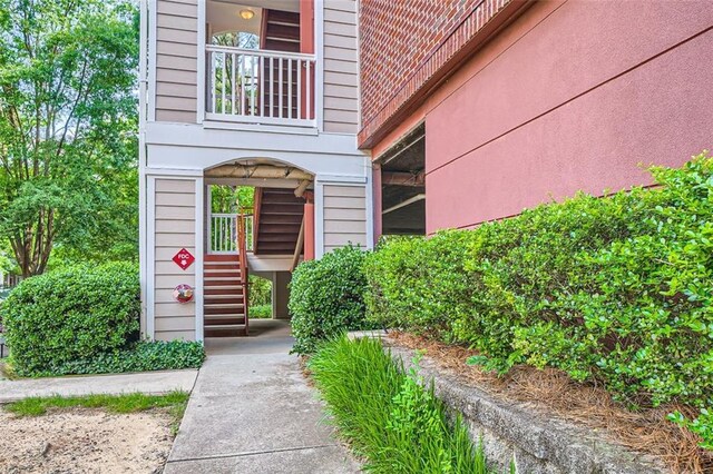 doorway to property featuring a balcony