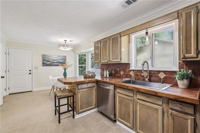 255 Broken Lance Pl, Johns Creek, GA 30022 - kitchen featuring dishwasher, a sink, a peninsula, backsplash, and ornamental molding