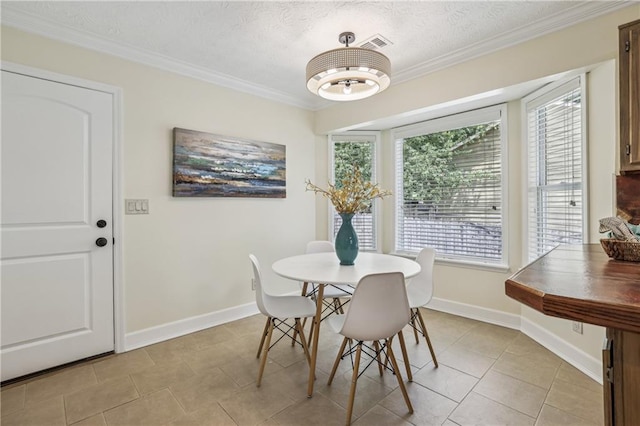255 Broken Lance Pl, Johns Creek, GA 30022 - dining space featuring baseboards, ornamental molding, light tile patterned flooring, and a textured ceiling